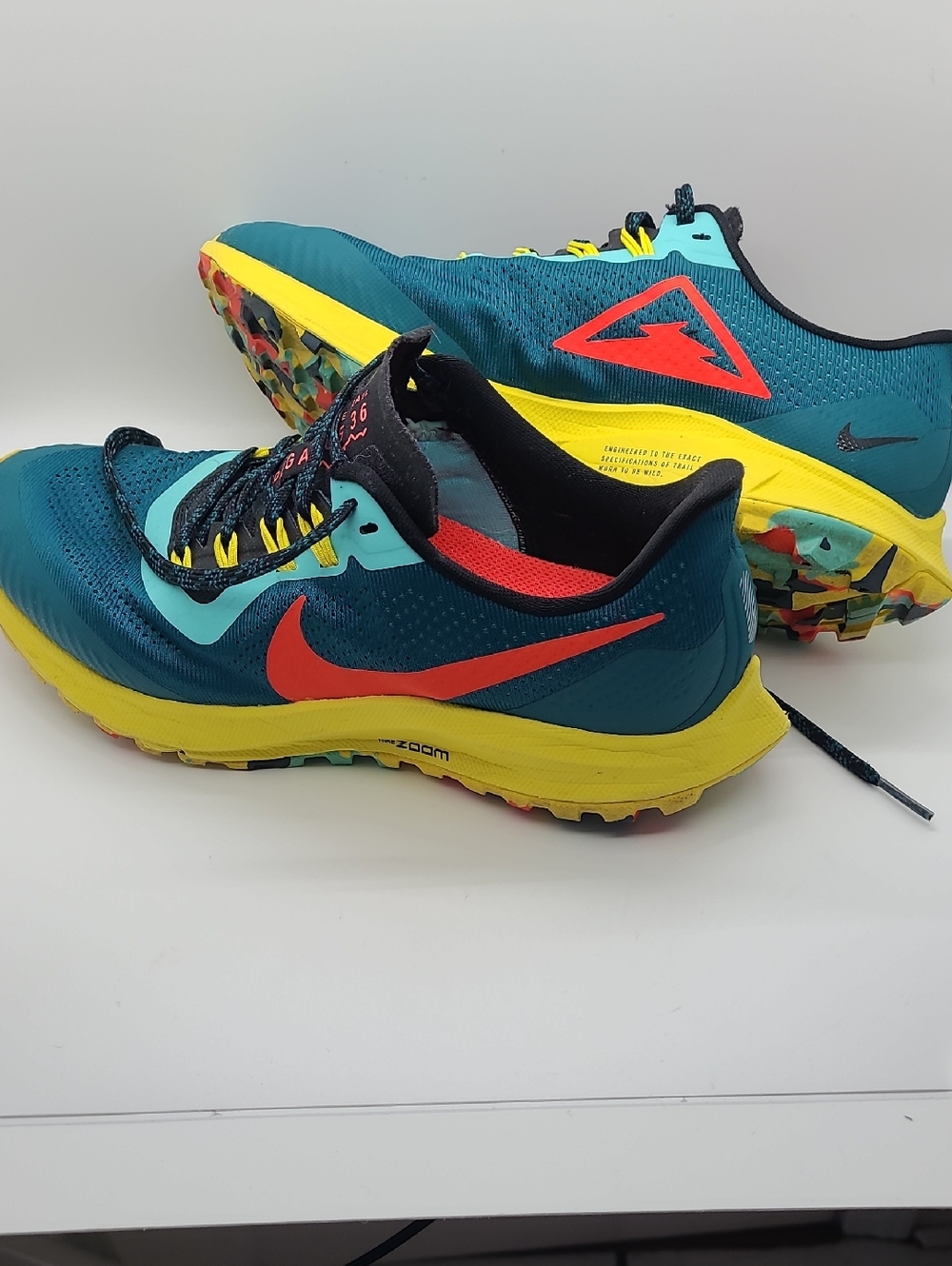 Nike Teal Trail Runners with Yellow Midsole and Red Swoosh